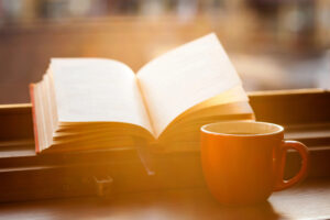 Open book about Relationships and a coffee cup