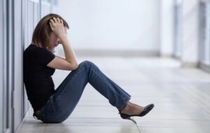 Young woman trying to deal with feeling anxiety